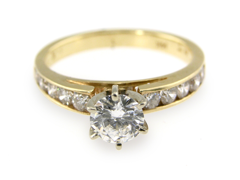 beautiful diamond encrusted gold engagement ring